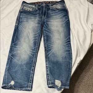 Woman’s Rock Revival Distressed Blue Jeans Arona